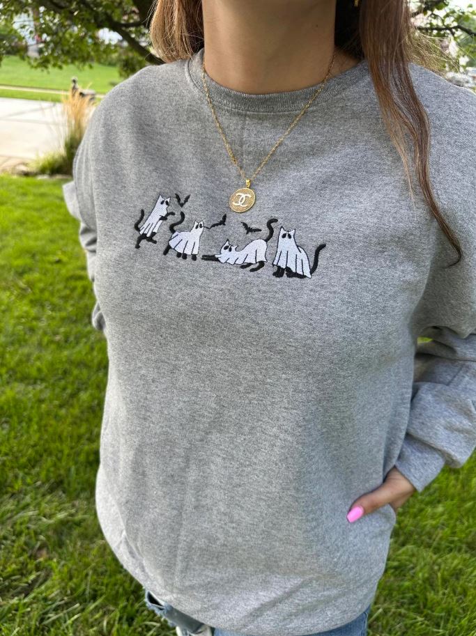 truyo Instead of cosplaying a whole ghost cat, wear a ghost cat embroidered sweatshirt.